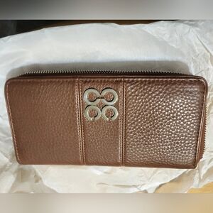 Coach Brown Pebbled Leather Zip Around Wallet.